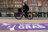 Scheme to protect pedestrians from phone thefts with 'purple pavement markings'