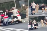 M25 punch up as woman drags driver out car by hair with six involved in road rage brawl