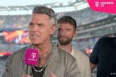 Truth behind viral Robbie Williams World Cup video as 'white substance falls from nose'