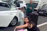 Couple ditch taxi and drag suitcases down motorway to catch holiday flight at airport