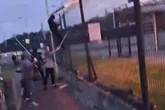 Rival football fans wield 'bats and iron bars' in major 'pre-arranged' brawl