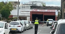 LiveHuddersfield shooting UPDATES: 3 men gunned down as 'masked' suspects at large