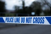 Two men die after four stabbed in horror attack at UK business premises