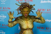 Huge celeb dresses as Medusa for Halloween - but can you guess who it is?