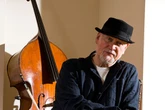 BREAKING 'Legendary' bass player of British band dies as tributes flood in