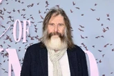 Can you name this British TV icon? Star sports bushy grey beard on red carpet
