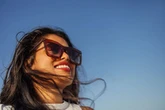 Why wearing sunglasses in all weathers is crucial for eye health, according to experts