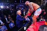 Lip reader spots Donald Trump's 8 words to UFC star who called Michelle Obama 'a man'