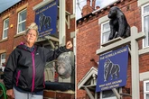 Fuming mum ordered to remove 4ft gorilla statue attached to her house by council