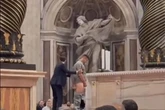 Man wees on altar at St Peter’s Basilica as onlookers gobsmacked by security breach