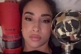 Legendary adult star poses with Champions League award won by Arsenal flop boyfriend
