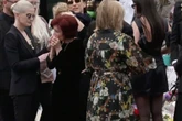 Sharon Osbourne in tears as she says goodbye to husband Ozzy at legend's funeral