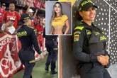 'World's hottest cop' distracts football fans and warns 'don't look or you'll go blind'