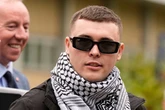 'Heads must roll' cry after terrorism charge against Kneecap rapper dropped following 'humiliating’ prosecution bungle