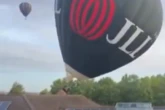 Hot air balloon crashes into Bristol primary school roof as people nearly 'fall out'