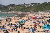 European heatwave leaves one dead as British holidaymakers warned to 'stay inside'