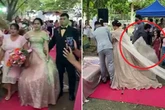 Bride hides man under wedding dress to stop it 'blowing around in the wind'
