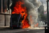 Belfast knife attack protestors set fire to bus as tensions rage despite calls for calm