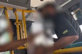 Wild moment fuming bus passenger attacks driver and attempts to take over the wheel