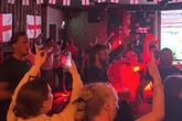 Brit pub offering strippers and free hot dogs for England fans during Ghana match