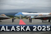 Putin gets 'red carpet' treatment as he lands in US for first time in 10 years to meet Trump