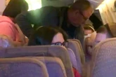Moment 'unruly' passenger restrained during an Emirates flight from Newcastle to Dubai