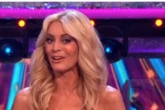 Strictly's Tess Daly branded 'stunning' as she sizzles in gown held up by luck alone