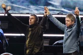 Rock band spark bitter Oasis feud with X-rated photo as Gallagher brothers invade America