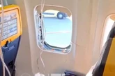 Ryanair horror as passenger 'sucked through dislodged window' as 'wife clings to legs'