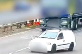 Shock video shows motorist almost reverse into lorry after missing motorway exit