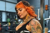 Tiny 4ft 8in tattooed powerlifter says 'gym bros' hate seeing her outlift men