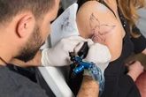 Seven surprising tattoo fans – from a caveman to a pair of British royals