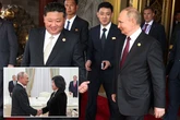 Putin meets North Korea puppet for 'outcast handshake' as they're choked with sanctions