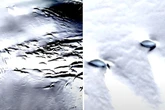 Antarctica mystery as two 'identical metallic UFOs' spotted emerging from snow