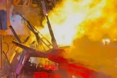 Moment Domino's Pizza 'erupts like a volcano' after multiple cars crash into buildings
