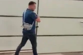 Tommy Robinson boards 'flight out of the country' after assault probe at station