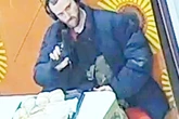 Moment man casually points weapon at teens in McDonald's