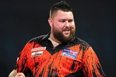Michael Smith survives huge scare in first match of World Darts Championship title defence