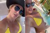 Britney Spears strips to skimpy yellow bikini after bizarre 'marriage' bombshell