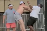 Mass 'WWE-style' brawl in riverside town sees chair-swinging scrapper dubbed 'Black Aquaman'