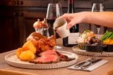 Pouring gravy onto someone else's dinner could earn you a right roasting, Brits say
