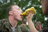 US Navy 'plebes' forced to down mustard and crawl through mud caves in wild sea trials