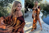 Amanda Holden flashes bum in sizzling swimsuit as she poses with Alan Carr