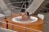 Couple spotted getting super steamy in balcony hot tub as expert dubs it a 'fantasy'