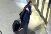 Missing woman caught in new CCTV footage hauling suitcase as police step up appeal