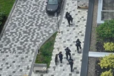 'Multiple shots fired' as armed police swarm with residents told 'stay inside'