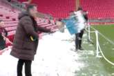 Gary Neville shovels snow on Anfield pitch to 'try and postpone' Man Utd clash