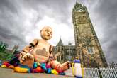 'Creepy' 24ft giant baby doll teaching aid that looks like Chucky terrifies kids