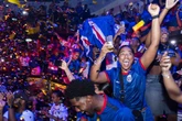 'Four shot' as gunfire erupts after World Cup minnows qualify for knockout rounds