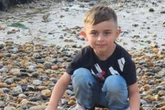 BREAKING Boy, 4, killed after 'falling under bus' as mum pays tribute to 'beautiful' son